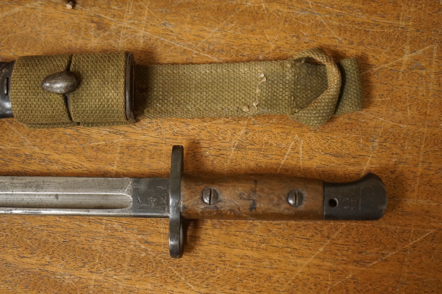 A collection of militaria including; a US Air Force camera Type N-6, a leather cased Bell & Howell Sportster camera and accessories, a pair of periscope binoculars, a leather cased compass by Goerz, Berlin